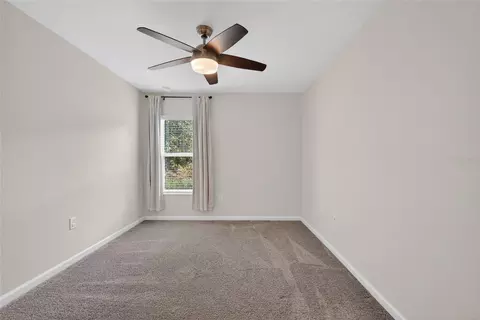 Bedroom - 4773 Magnetite Loop, Mount Dora, FL 32757 photo 7 of 8