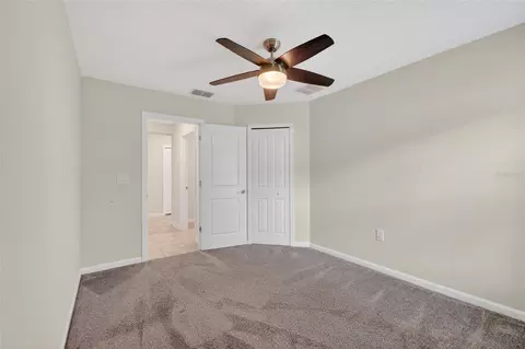 Bedroom - 4773 Magnetite Loop, Mount Dora, FL 32757 photo 8 of 8