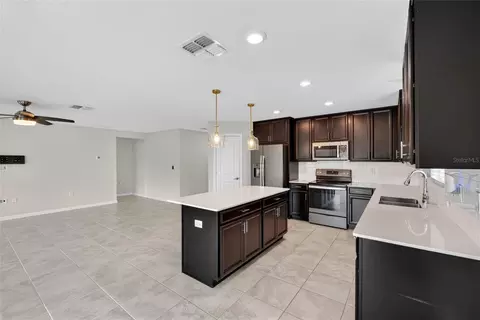 Kitchen - 4773 Magnetite Loop, Mount Dora, FL 32757 photo 2 of 3