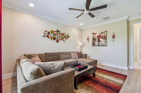Living - 7447 Lancaster Loop, Wesley Chapel, FL 33545 photo 12 of 14