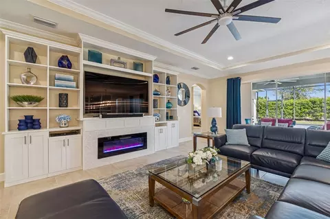 Living - 7447 Lancaster Loop, Wesley Chapel, FL 33545 photo 9 of 14