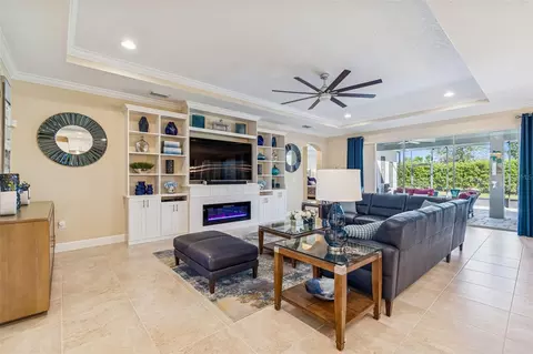 Living - 7447 Lancaster Loop, Wesley Chapel, FL 33545 photo 2 of 14