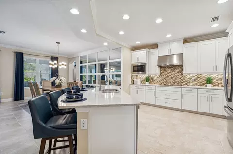 Kitchen - 7447 Lancaster Loop, Wesley Chapel, FL 33545 photo 2 of 7