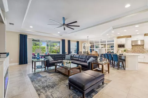 Living - 7447 Lancaster Loop, Wesley Chapel, FL 33545 photo 3 of 14