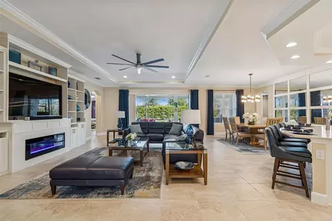 Living - 7447 Lancaster Loop, Wesley Chapel, FL 33545 photo 4 of 14