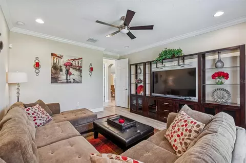Living - 7447 Lancaster Loop, Wesley Chapel, FL 33545 photo 5 of 14