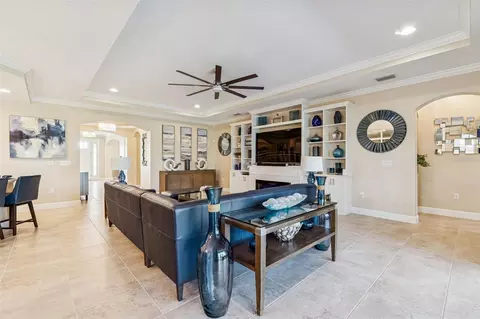 Living - 7447 Lancaster Loop, Wesley Chapel, FL 33545 photo 10 of 14