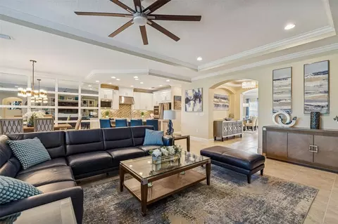 Living - 7447 Lancaster Loop, Wesley Chapel, FL 33545 photo 8 of 14