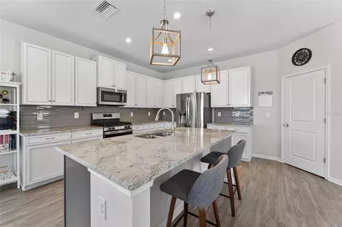Kitchen - 12273 Blue Pacific Dr, Riverview, FL 33579 photo 3 of 6