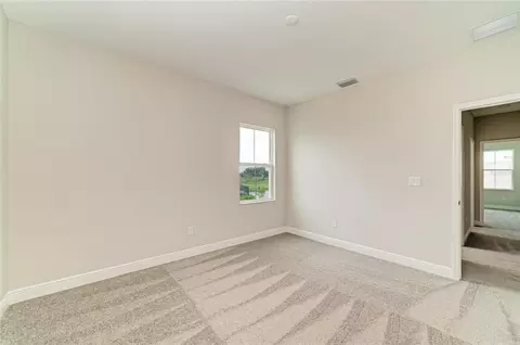 Bedroom - 10245 Cross River Trl, Parrish, FL 34219 photo 8 of 11