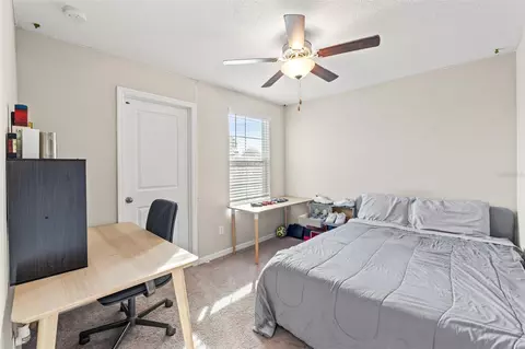 Bedroom - 313 Argyll Dr, Spring Hill, FL 34609 photo 8 of 11