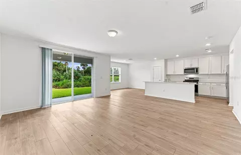 Living - 9877 Trellis Vine Way, Parrish, FL 34219 photo 2 of 2