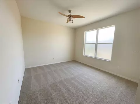 Bedroom - 18010 Java Isle Dr, Tampa, FL 33647 photo 5 of 6