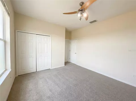 Bedroom - 18010 Java Isle Dr, Tampa, FL 33647 photo 6 of 6