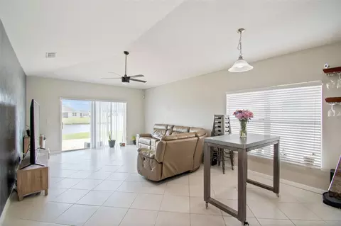 Living - 3416 Mallard Pond Blvd, Saint Cloud, FL 34772 photo 6 of 6