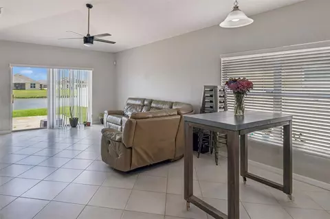 Living - 3416 Mallard Pond Blvd, Saint Cloud, FL 34772 photo 4 of 6