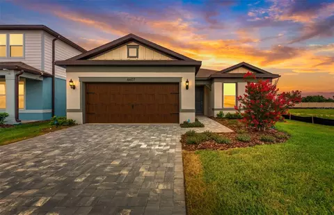 Exterior - 6607 Asbury Barnes Ln, Wesley Chapel, FL 33545 photo 4 of 6