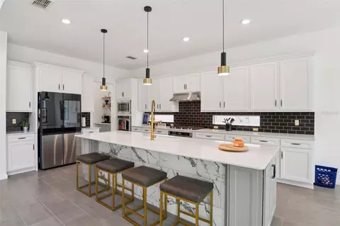 Kitchen - 11473 Owasee Trails Pl, Riverview, FL 33569 photo 3 of 5