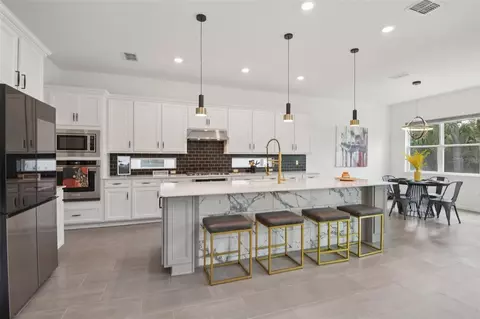 Kitchen - 11473 Owasee Trails Pl, Riverview, FL 33569 photo 1 of 5