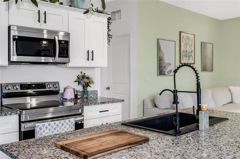 Kitchen - 10459 Ladybug Cv, Parrish, FL 34219 photo 5 of 6