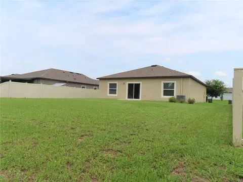 Exterior - 13149 Conquistador Loop, Spring Hill, FL 34610 photo 7 of 12