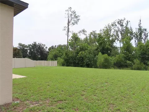 Exterior - 13149 Conquistador Loop, Spring Hill, FL 34610 photo 11 of 12