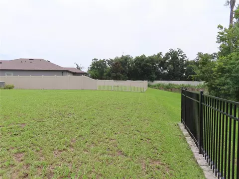 Exterior - 13149 Conquistador Loop, Spring Hill, FL 34610 photo 9 of 12