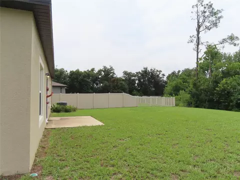 Exterior - 13149 Conquistador Loop, Spring Hill, FL 34610 photo 10 of 12