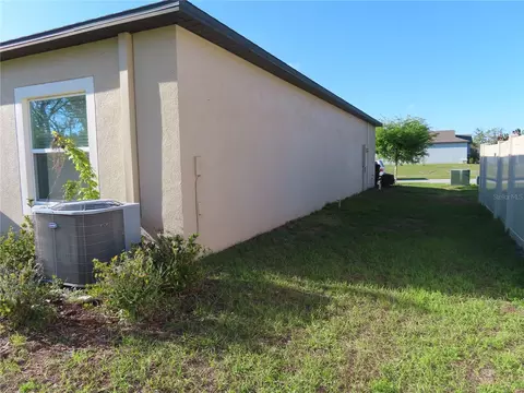 Exterior - 13149 Conquistador Loop, Spring Hill, FL 34610 photo 4 of 9