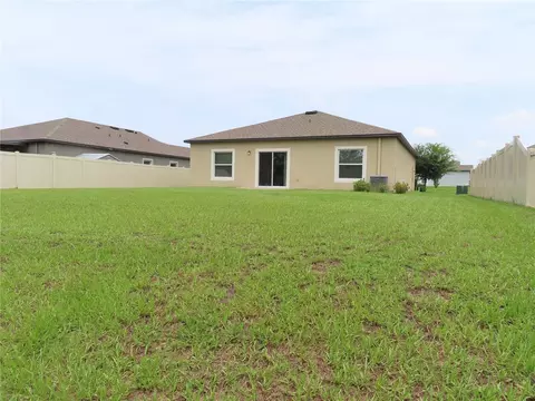 Exterior - 13149 Conquistador Loop, Spring Hill, FL 34610 photo 5 of 12
