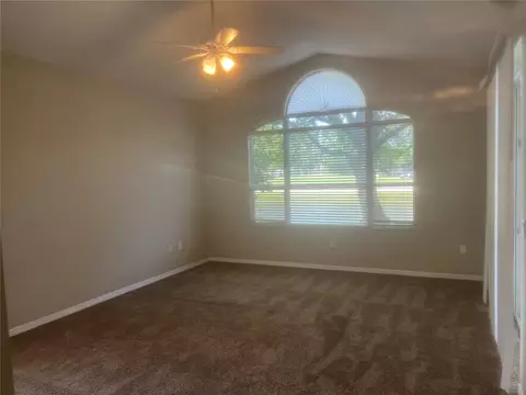 Living - 18914 Maisons Dr, Lutz, FL 33558 photo 7 of 12