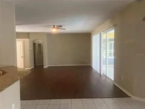 Living - 18914 Maisons Dr, Lutz, FL 33558 photo 2 of 12
