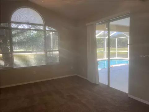 Living - 18914 Maisons Dr, Lutz, FL 33558 photo 9 of 12