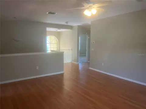 Living - 18914 Maisons Dr, Lutz, FL 33558 photo 11 of 12