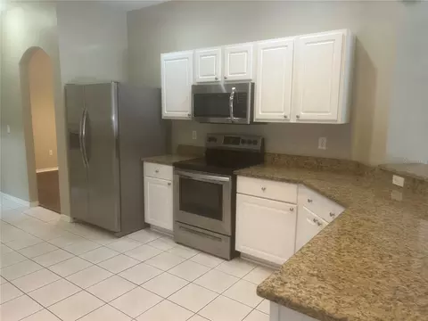 Kitchen - 18914 Maisons Dr, Lutz, FL 33558 photo 2 of 4