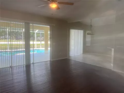 Living - 18914 Maisons Dr, Lutz, FL 33558 photo 6 of 12