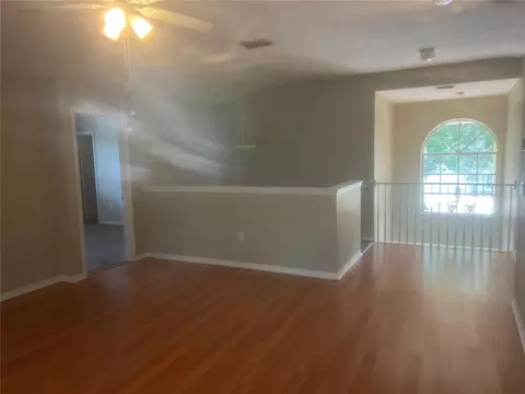 Living - 18914 Maisons Dr, Lutz, FL 33558 photo 10 of 12