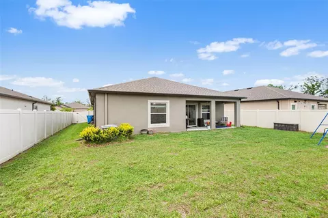 Exterior - 12960 Conquistador Loop, Spring Hill, FL 34610 photo 5 of 7