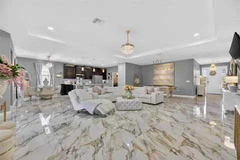 Living - 5030 Jagged Cloud Dr, Wimauma, FL 33598 photo 3 of 6