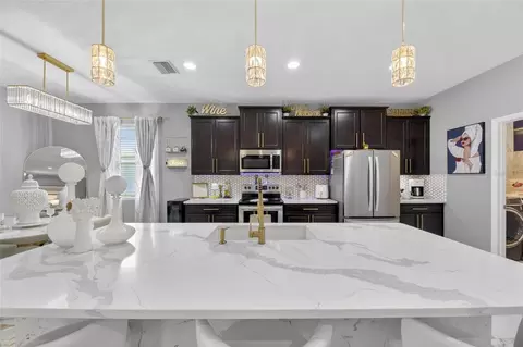 Kitchen - 5030 Jagged Cloud Dr, Wimauma, FL 33598 photo 2 of 5