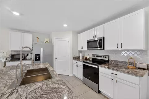 Kitchen - 3255 Silver Date Dr, Wimauma, FL 33598 photo 5 of 7