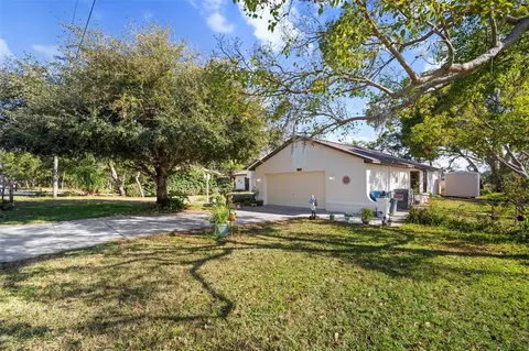Exterior - 1472 Ivydale Rd, Spring Hill, FL 34606 photo 4 of 13