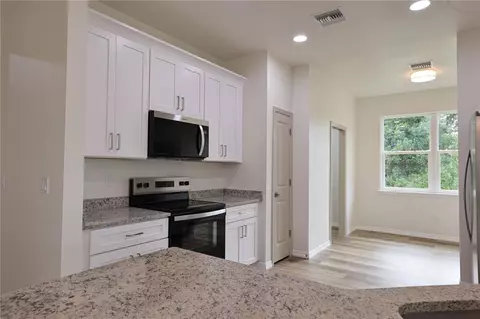 Kitchen - 7825 Pine Glen Rd, Sebring, FL 33876 photo 3 of 4