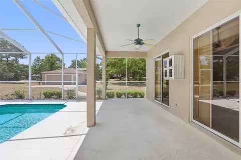 Exterior - 13185 Cooper Rd, Spring Hill, FL 34609 photo 11 of 18