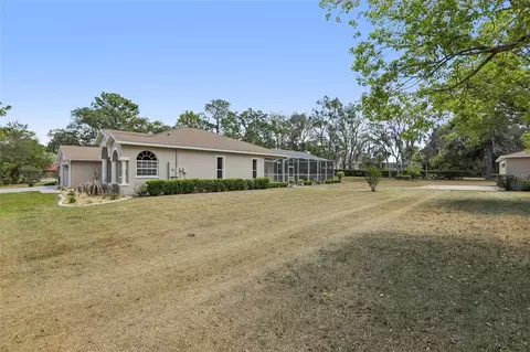 Exterior - 13185 Cooper Rd, Spring Hill, FL 34609 photo 9 of 18