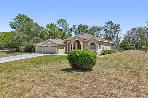 Exterior - 13185 Cooper Rd, Spring Hill, FL 34609 photo 14 of 18