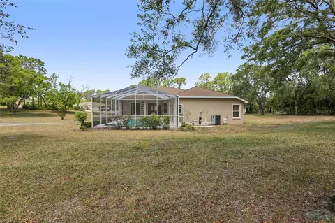 Exterior - 13185 Cooper Rd, Spring Hill, FL 34609 photo 7 of 18