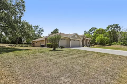 Exterior - 13185 Cooper Rd, Spring Hill, FL 34609 photo 2 of 18