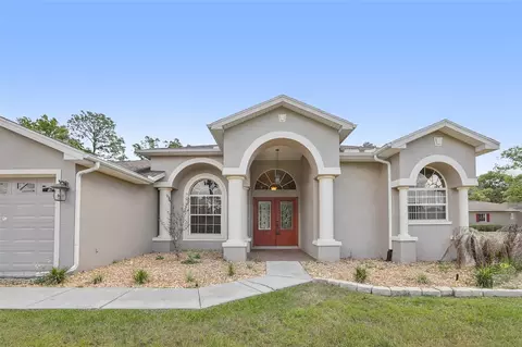 Exterior - 13185 Cooper Rd, Spring Hill, FL 34609 photo 4 of 18