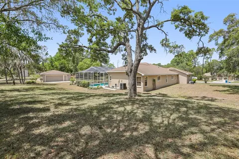 Exterior - 13185 Cooper Rd, Spring Hill, FL 34609 photo 6 of 18